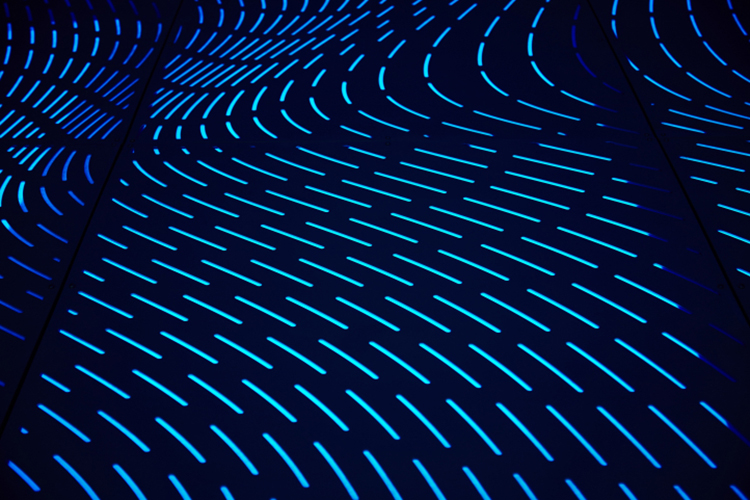 Wall covered in angular blue lights