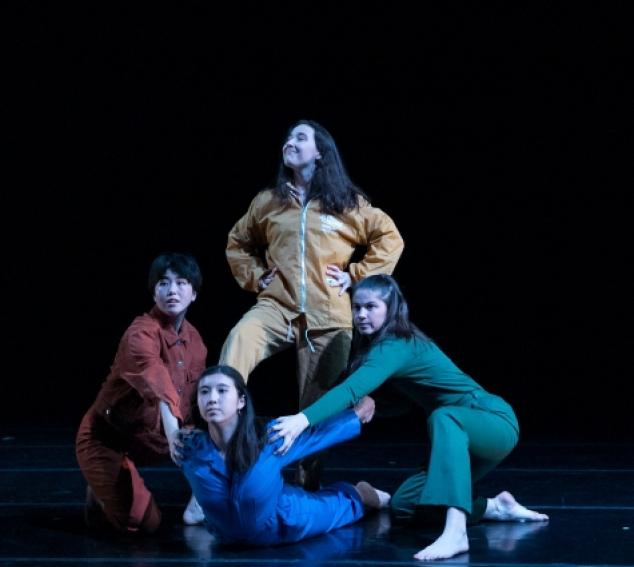 dancers make the shape of a boat