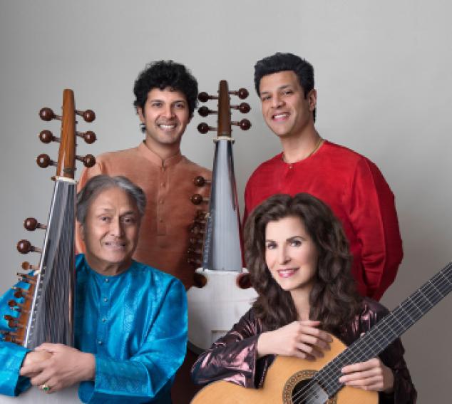 Four performers pose with their string instruments against a neutral background