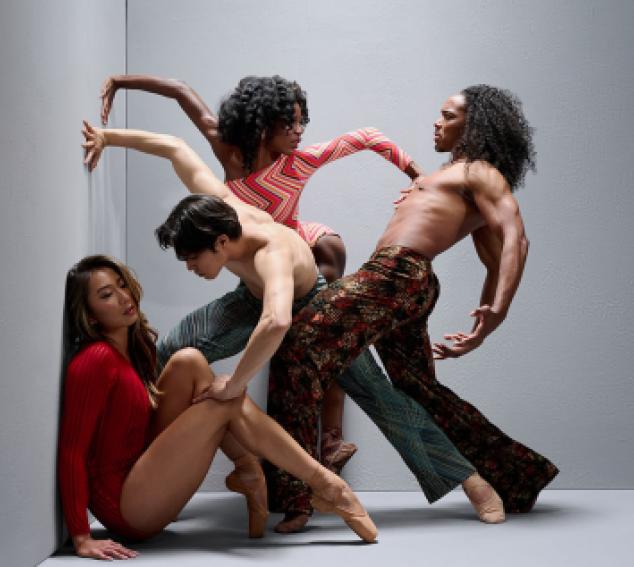 Four dancers in an abstract pose