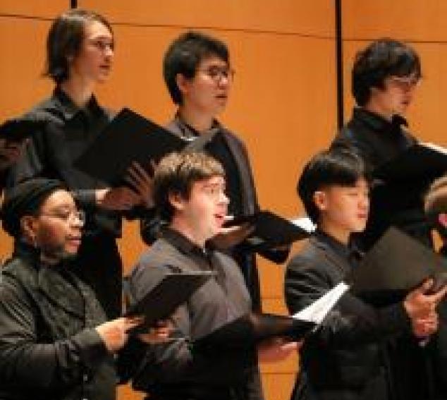 University Singers in rehearsal at Meany Hall (Photo: Cyan Duong). 
